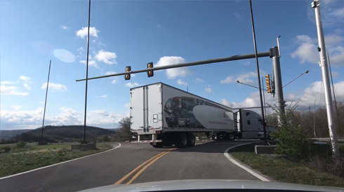 Driver view of a heavy vehicle making a wide right turn